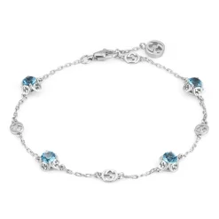 Armband aus 18 kt Weißgold mit Topasen und Interlocking G-Detail