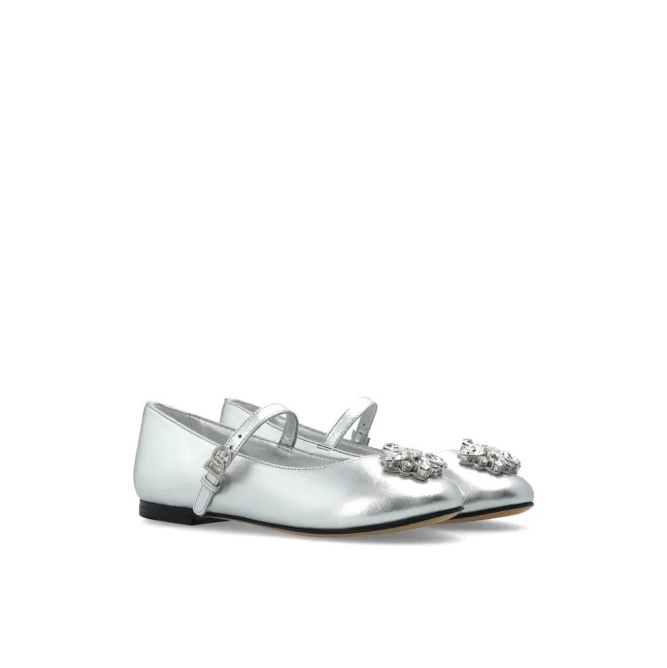 Ballerinas aus Nappaleder mit Brosche