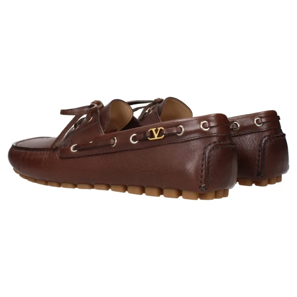 Braune Leder-Slipper im Vintage-Stil