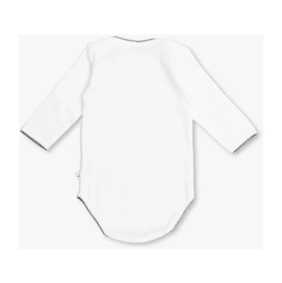 Geschenkset: Bodysuit 7er-Pack, Haarbürste und Zahndose.