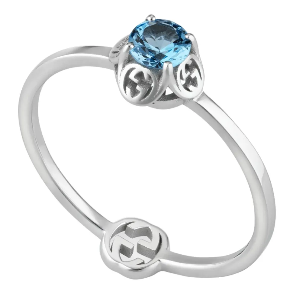 Interlocking G Ring in 18kt Weißgold mit Topas und Detail