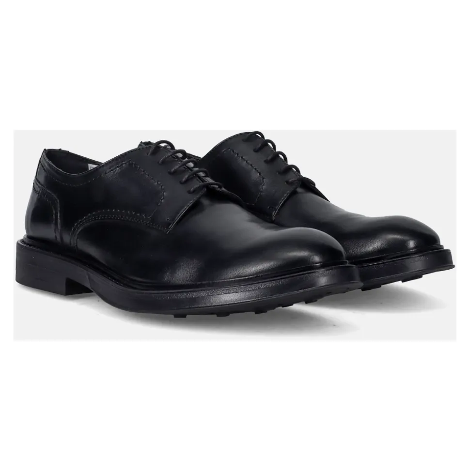 Klassische schwarze flache Schuhe