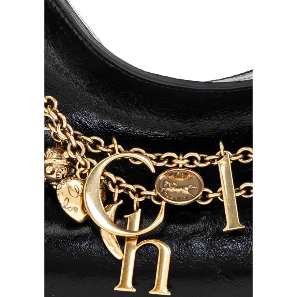 Schultertasche Charms