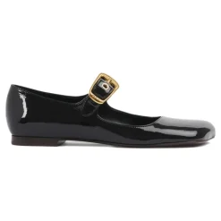 Schwarze Ballerinas mit übergroßer goldener Schnalle