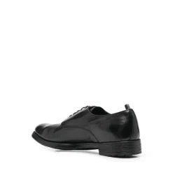 Schwarze flache Schuhe