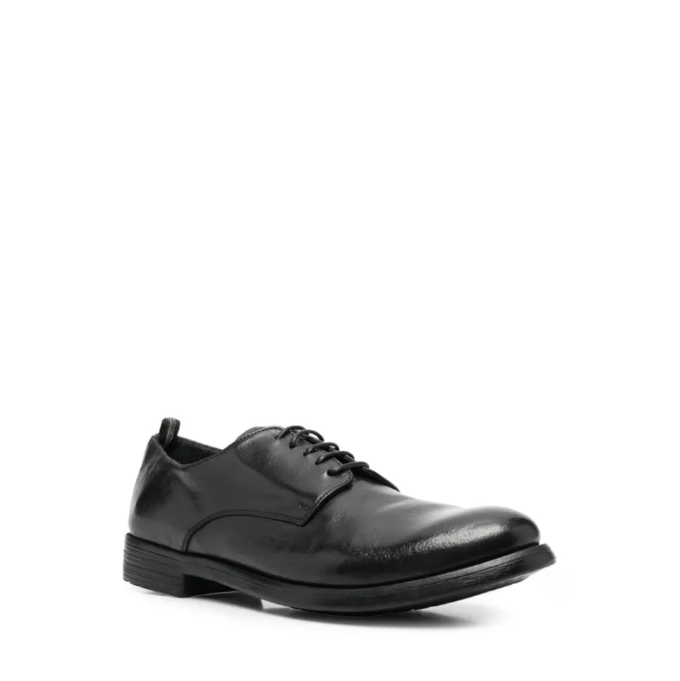 Schwarze flache Schuhe