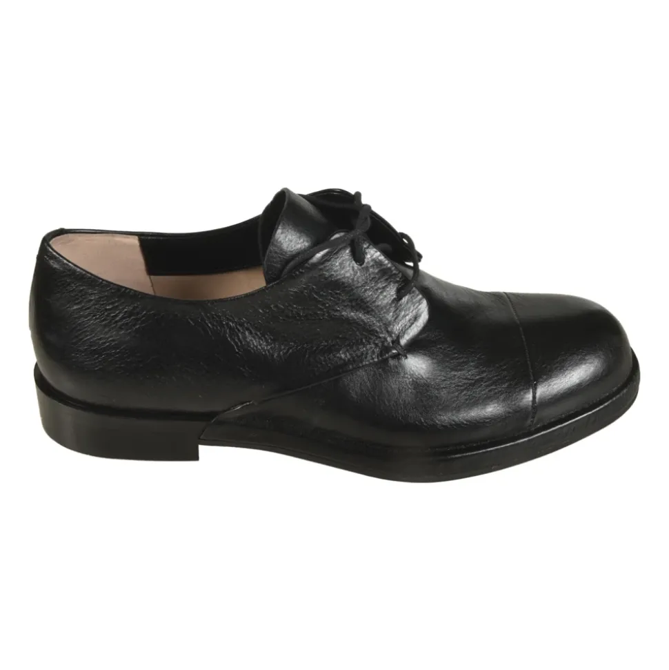 Schwarze flache Schuhe