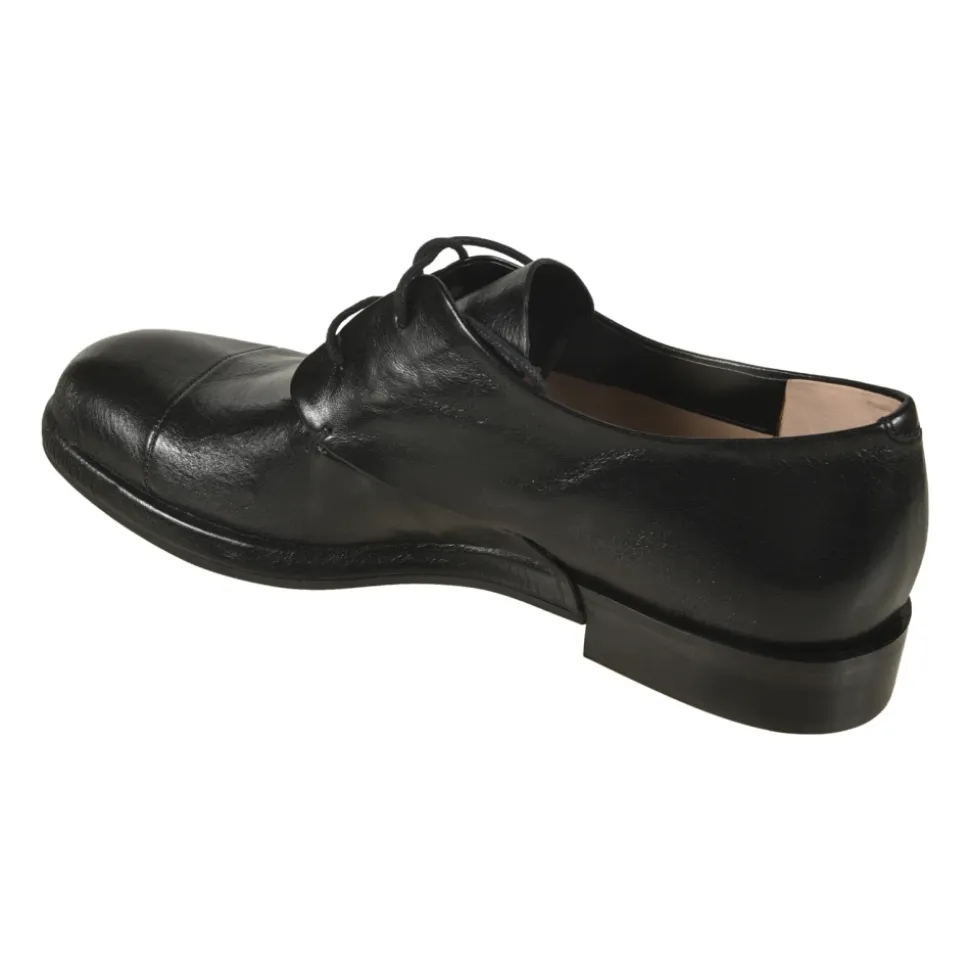 Schwarze flache Schuhe