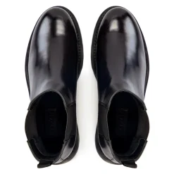 Schwarze isolierte Chelsea-Stiefel
