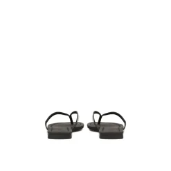Schwarze, lackierte Flip-Flops