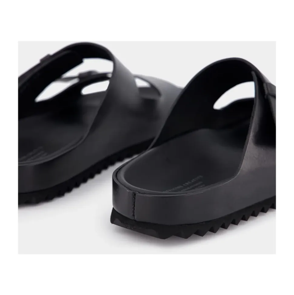 Schwarze Ledersandalen