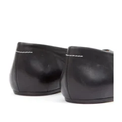 Schwarze Lederschuhe flach