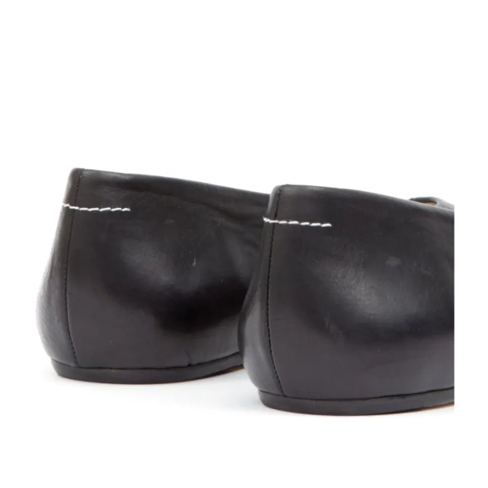 Schwarze Lederschuhe flach