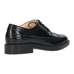 Schwarze Lederschuhe mit englischen Perforationen