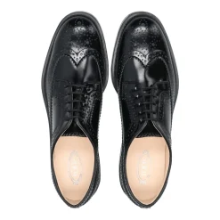 Schwarze Lederschuhe mit englischen Perforationen
