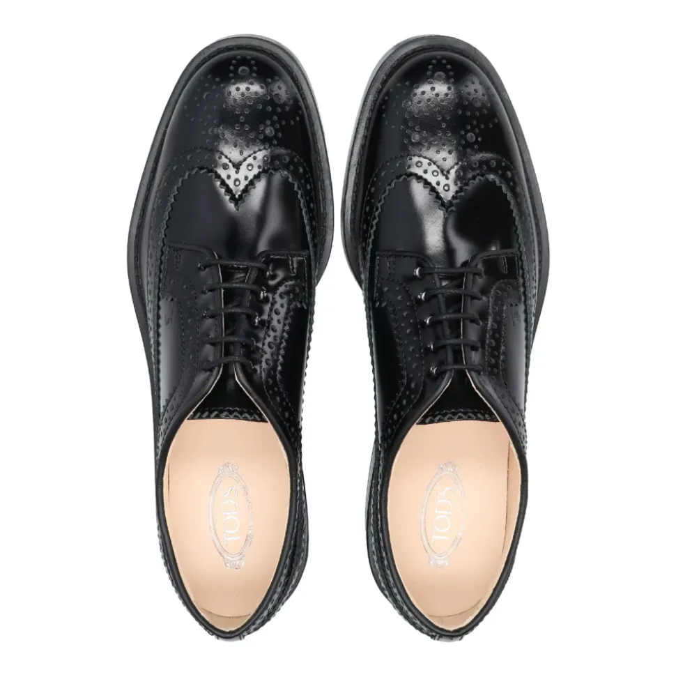 Schwarze Lederschuhe mit englischen Perforationen