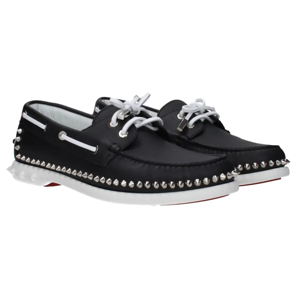 Schwarze Lederslipper mit Nieten