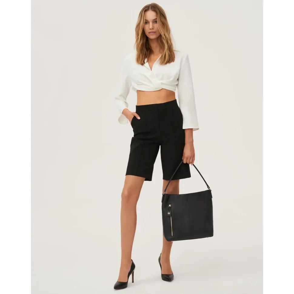 Schwarze Pumps für Damen.Dieses Produkt fällt groß aus.