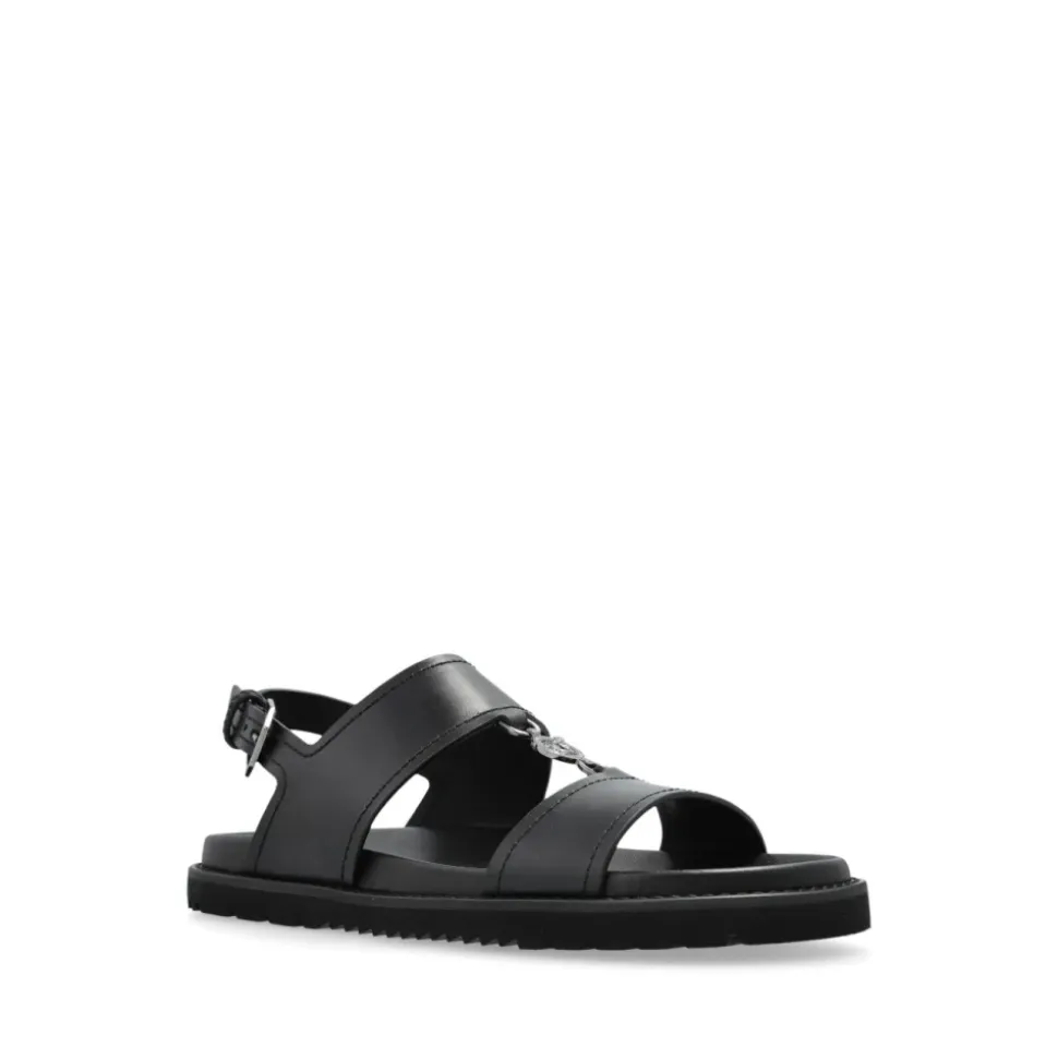 Schwarze Sandalen mit Schnalle und flacher Gummisohle