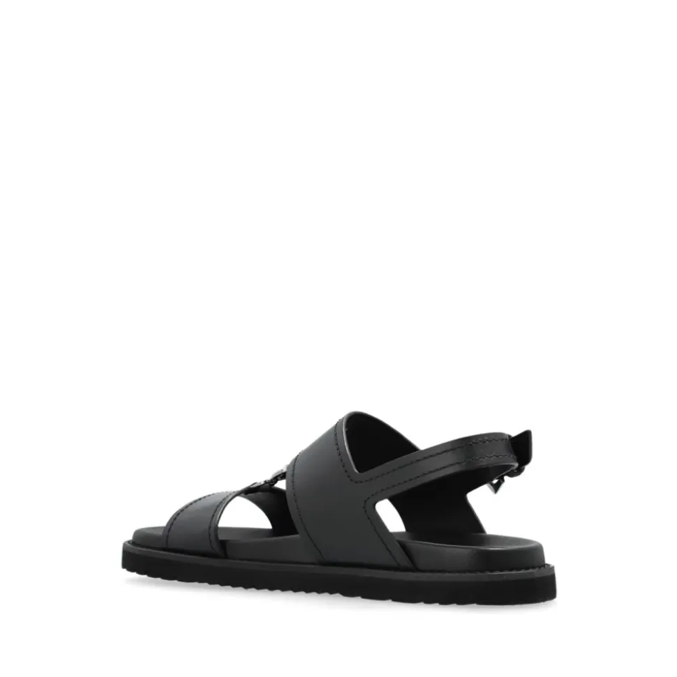 Schwarze Sandalen mit Schnalle und flacher Gummisohle