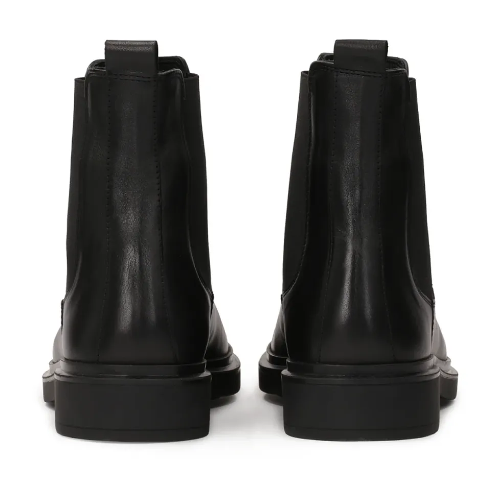 Schwarze Slipper aus glattem Leder