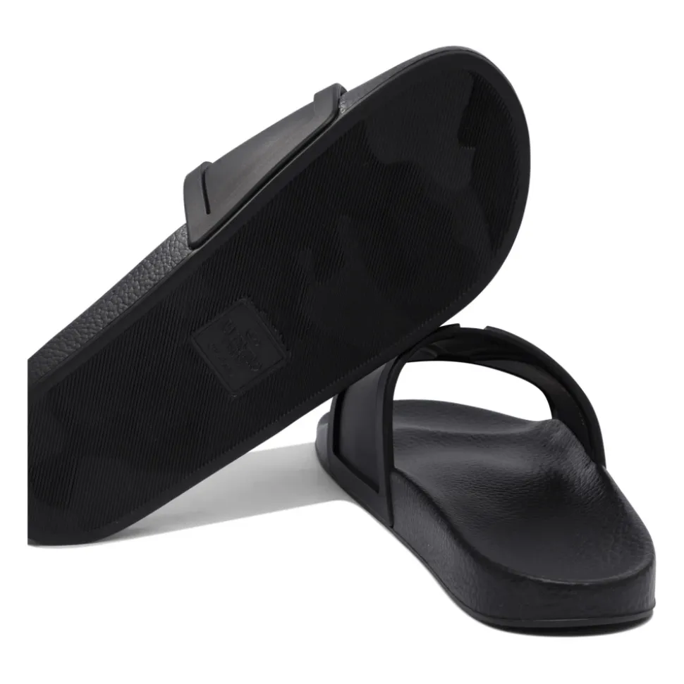 Schwarze Vlogo Slides Sandalen