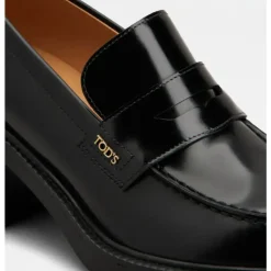 Schwarzer Kalbsleder-Loafer mit geprägtem Logo