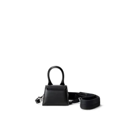 Schwarzer Leder-Sweatshirt und Mini-Tasche