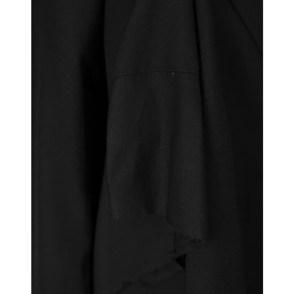 Wolljacke mit Stoffapplikationen